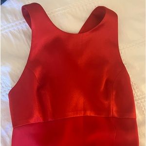 Beautiful long evening red dress with criss cross back. Size 4